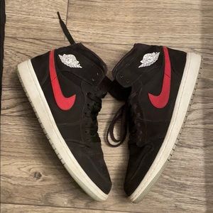 Air Jordan’s. Black with Red and Blue Swooshes